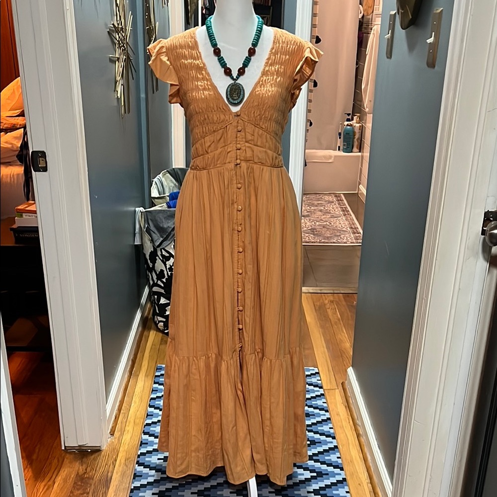 Bohemian feminine Anthropologie Orange Maxi Dress. Plunging neckline.
